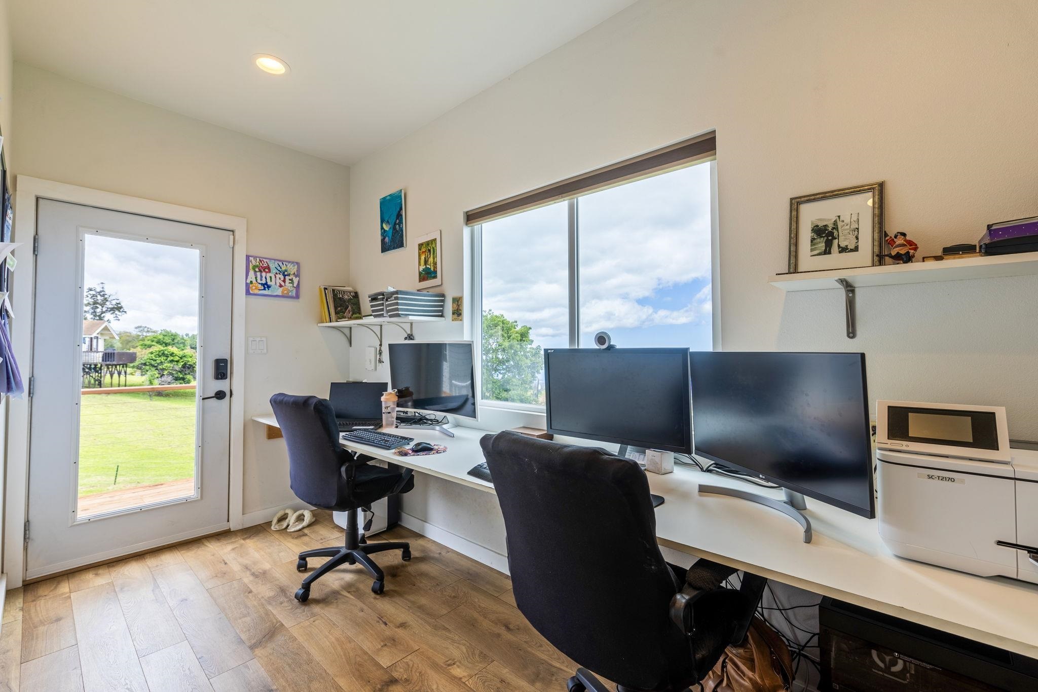 59 Waipoli Road Kula, HI 96790 - Photo 29 of 47 a view of a workspace with furniture and a window