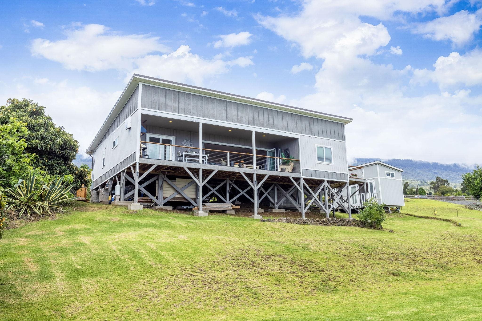 59 Waipoli Road Kula, HI 96790 - Photo 3 of 47 a view of a house with yard and sitting area