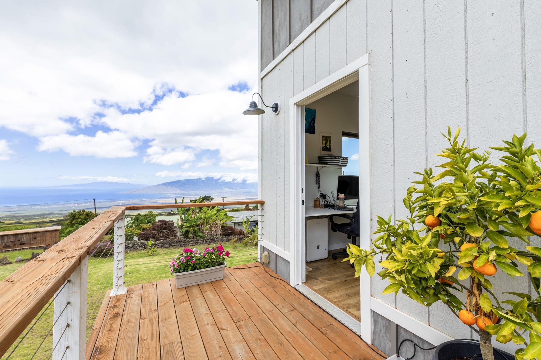 59 Waipoli Road Kula, HI 96790 - Photo 31 of 47 a view of a balcony with wooden floor and outdoor space