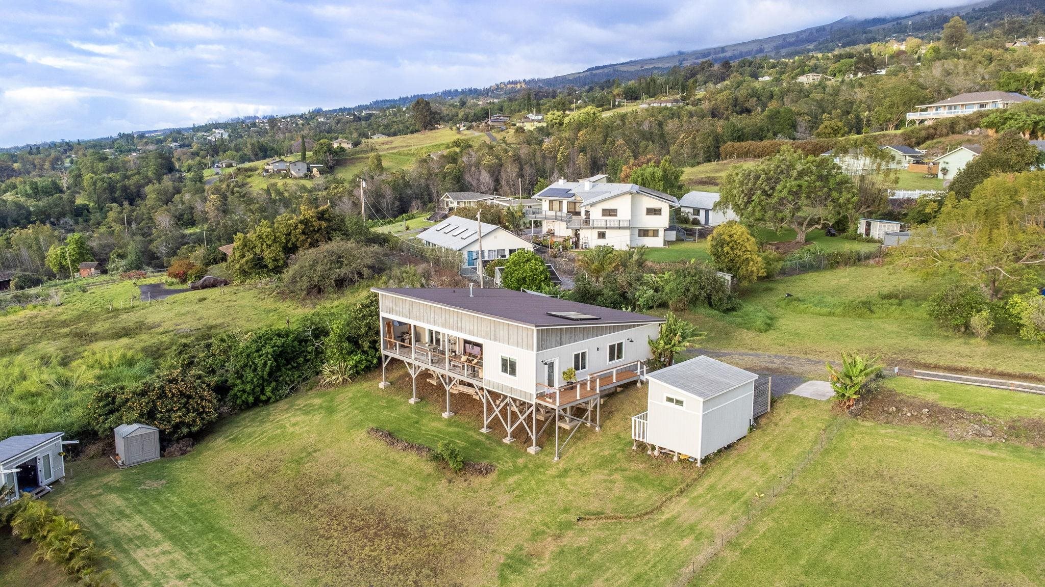 59 Waipoli Road Kula, HI 96790 - Photo 4 of 47 a aerial view of a house with a garden