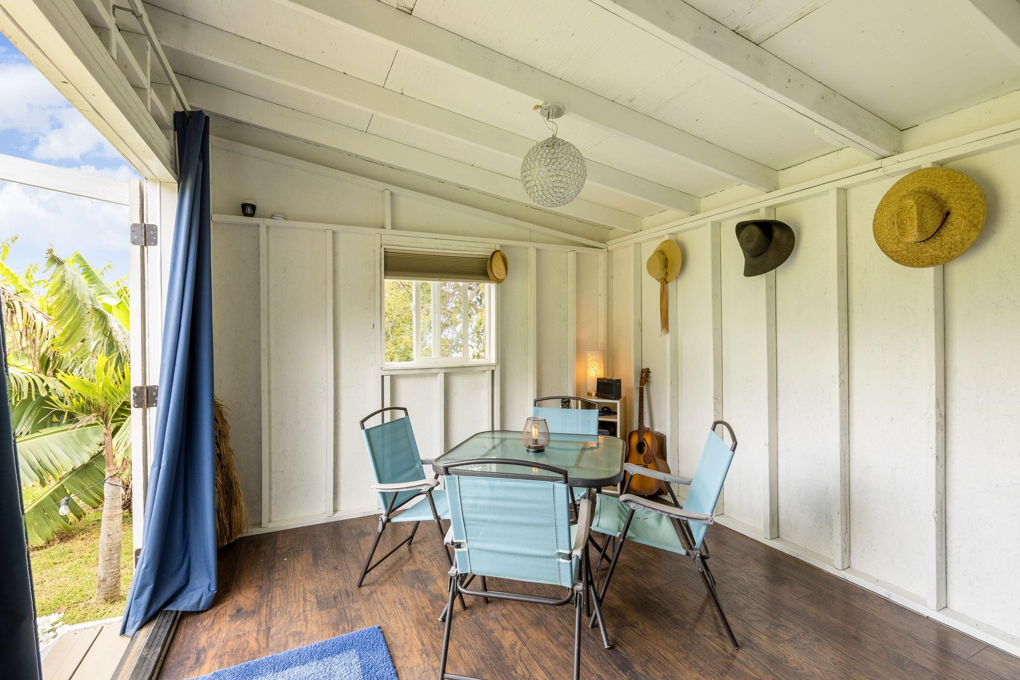 59 Waipoli Road Kula, HI 96790 - Photo 41 of 47 a view of a dining room with furniture and a window
