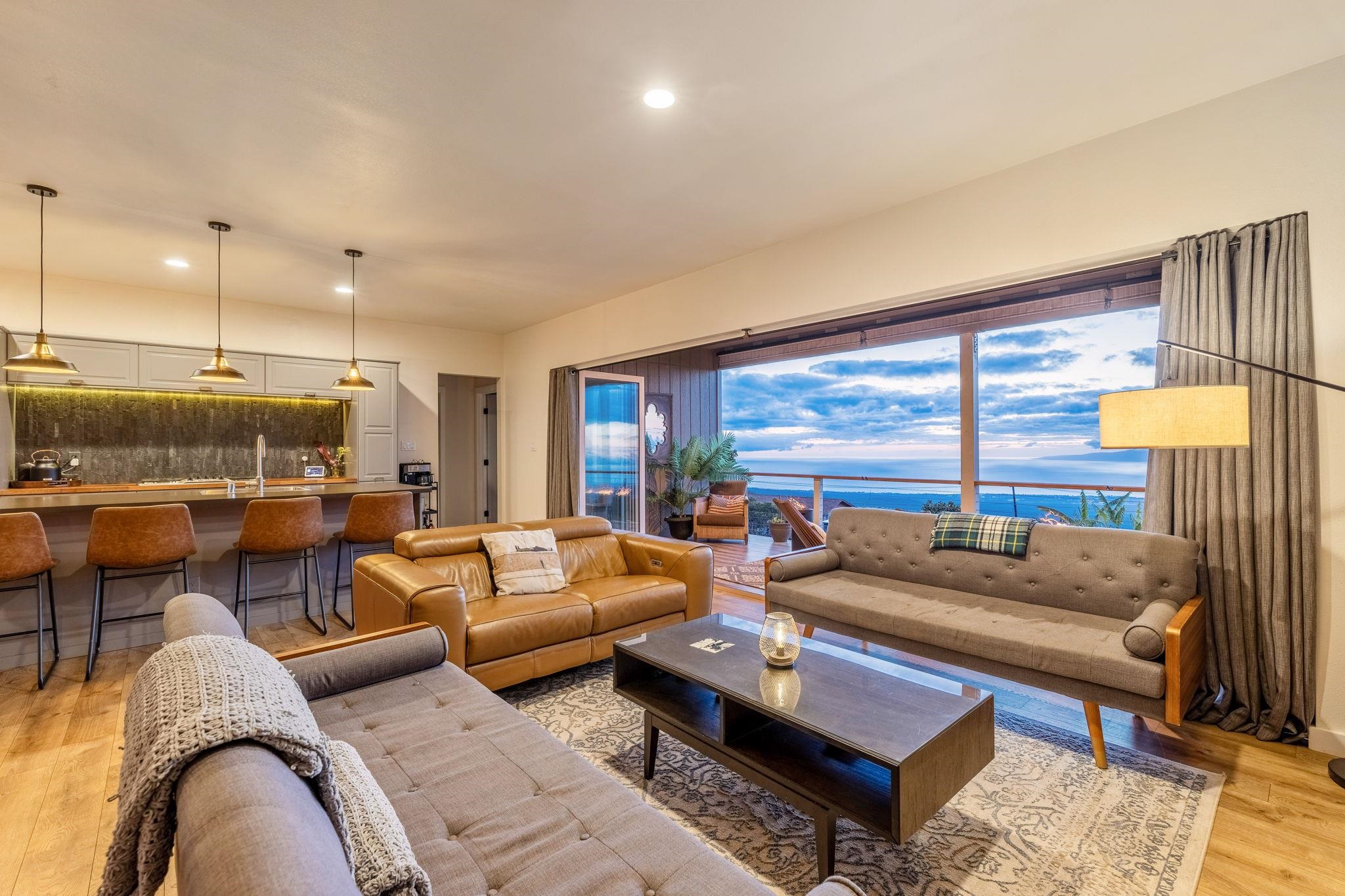 59 Waipoli Road Kula, HI 96790 - Photo 8 of 47 a living room with furniture and a large window