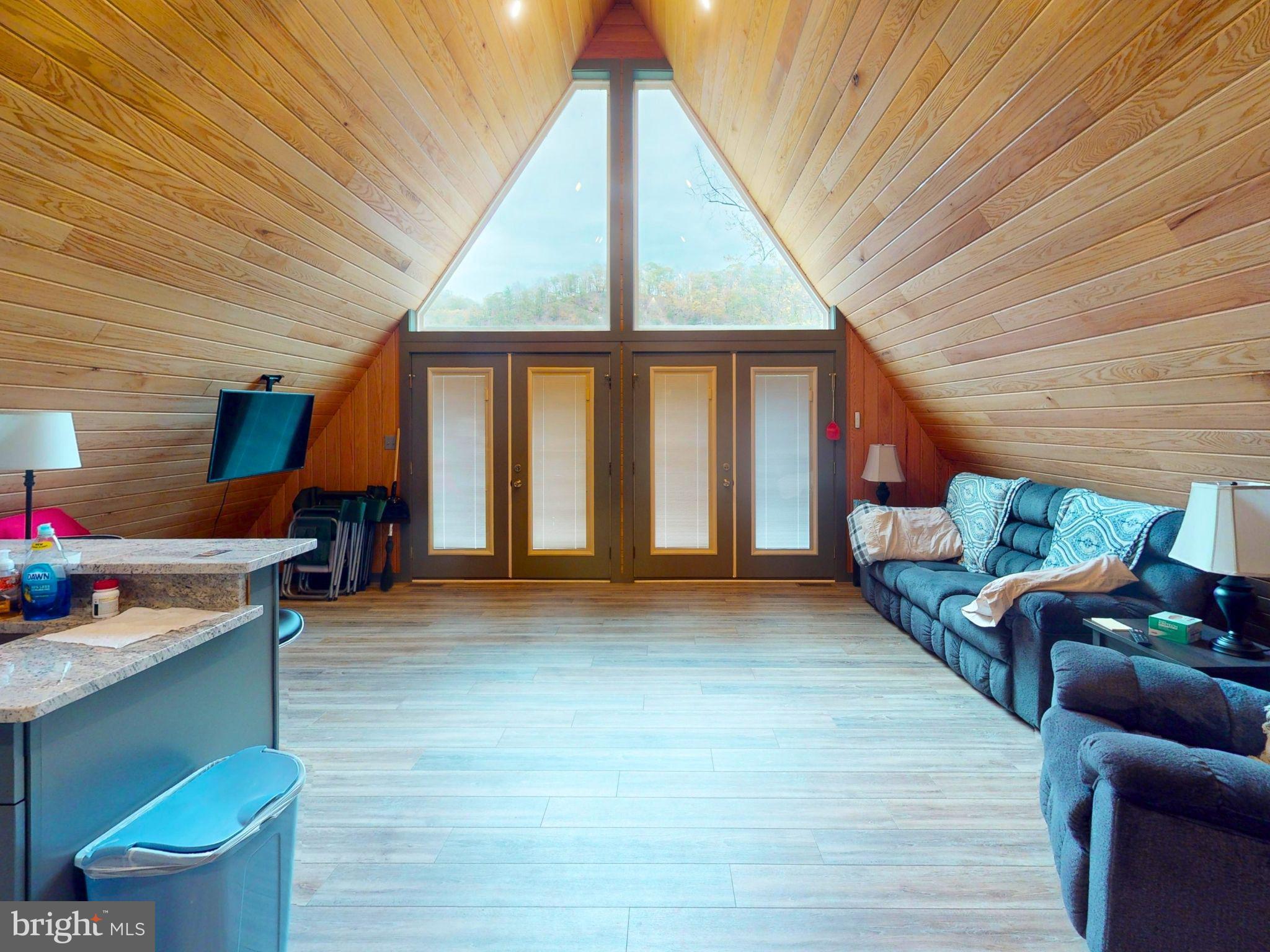 12076 Point Road Huntingdon, PA 16652 - Photo 7 of 13 a view of an empty room with a window