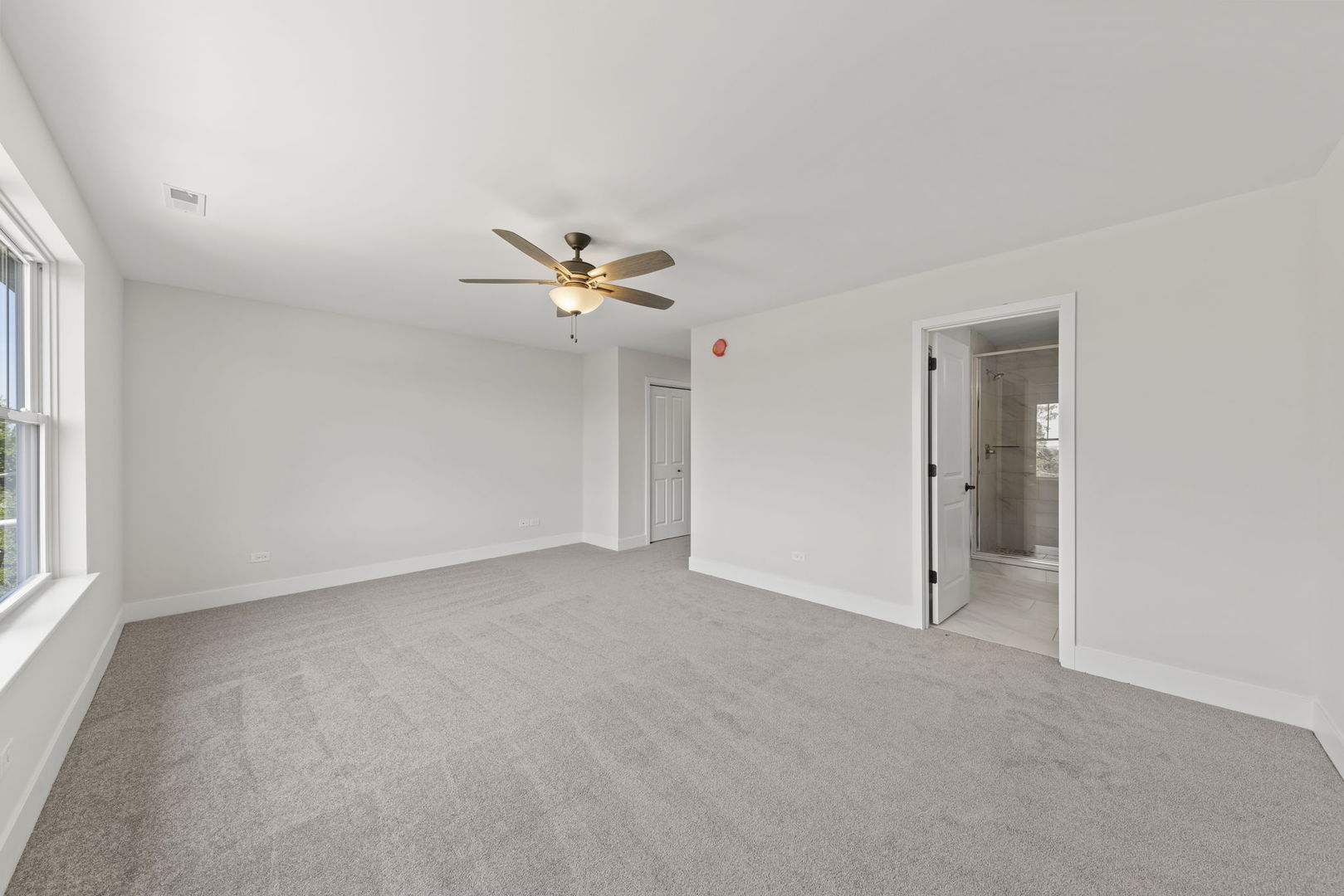 534 McCarthy Street Lemont, IL 60439 - Photo 15 of 23 a view of an empty room with a window