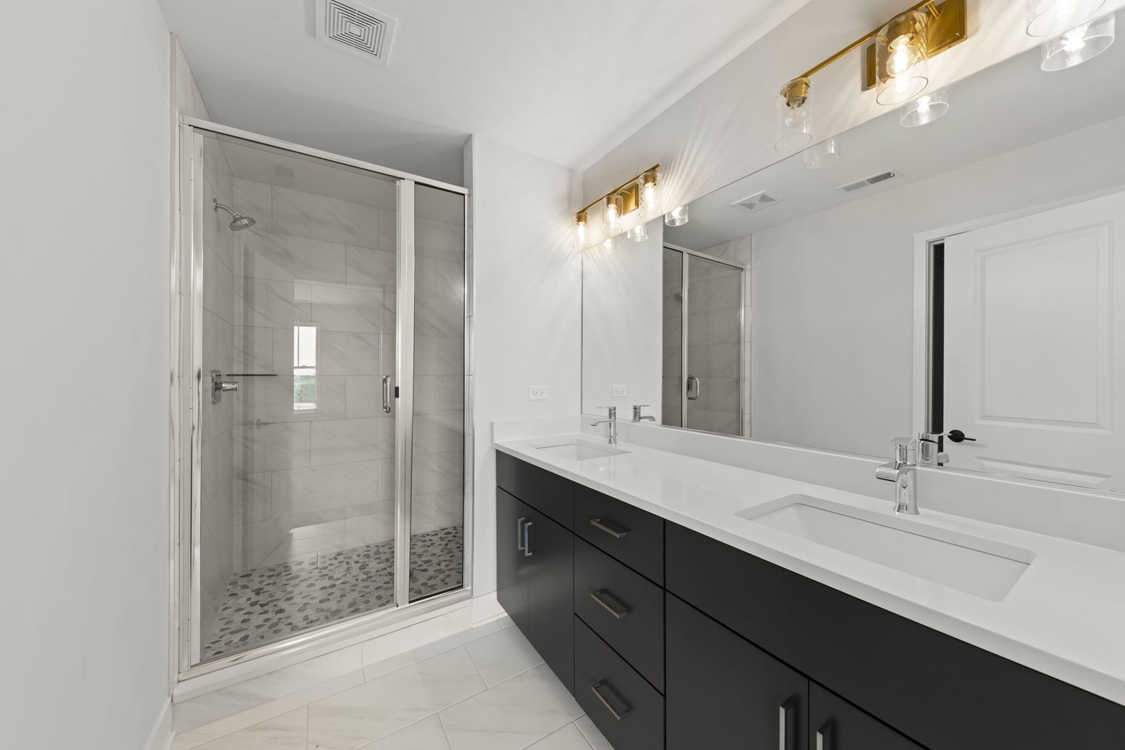 534 McCarthy Street Lemont, IL 60439 - Photo 16 of 23 a bathroom with a double vanity sink mirror and shower