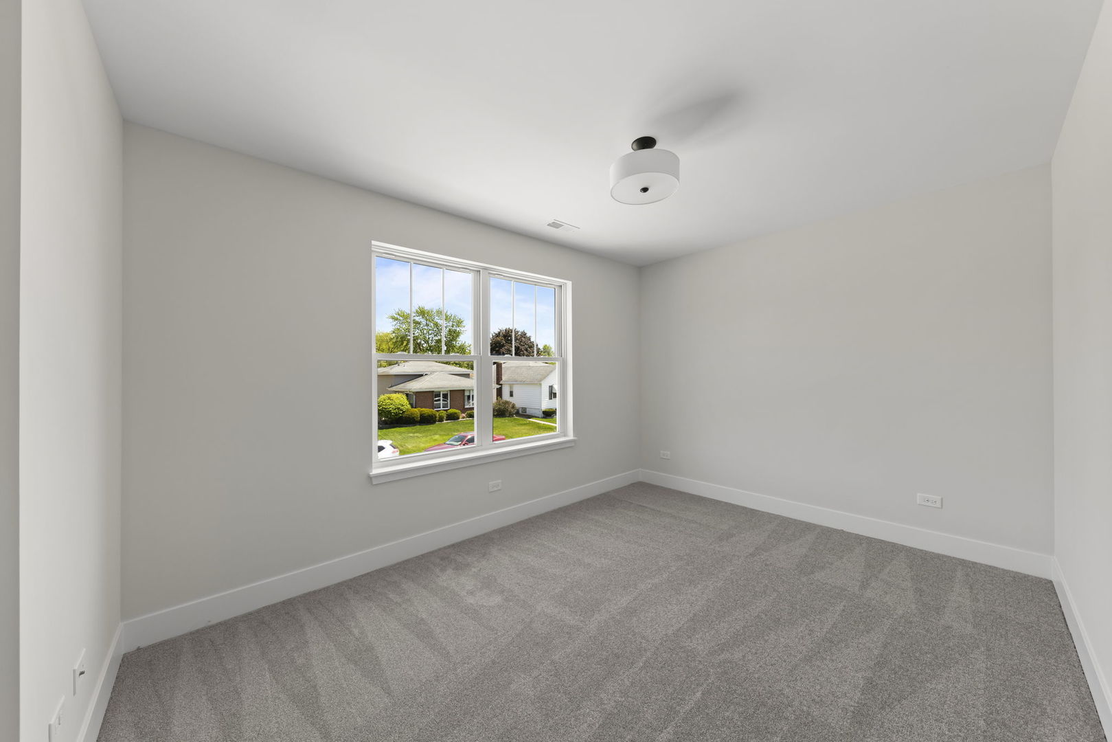 534 McCarthy Street Lemont, IL 60439 - Photo 17 of 23 an empty room with window