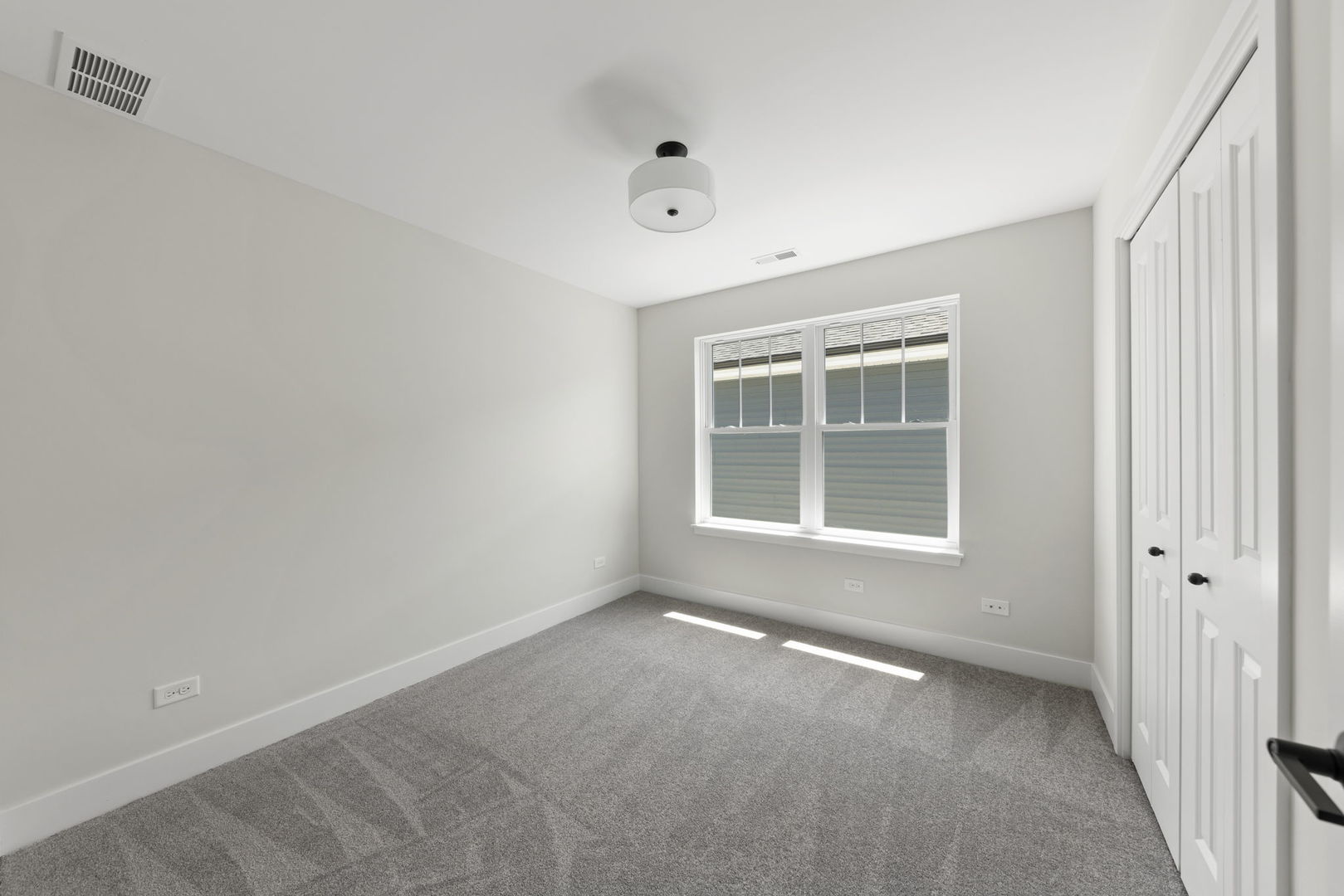 534 McCarthy Street Lemont, IL 60439 - Photo 18 of 23 a view of an empty room with a window