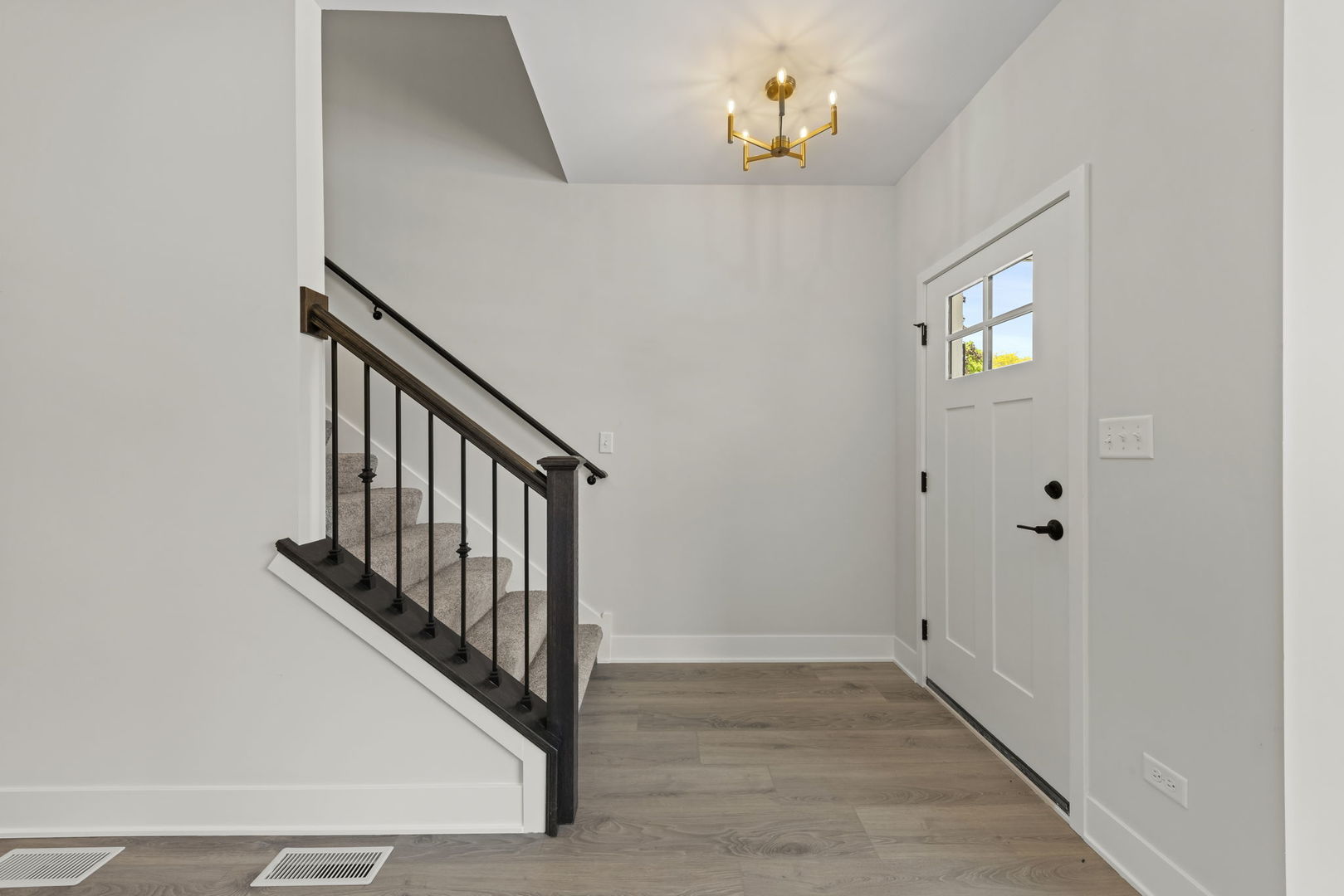 534 McCarthy Street Lemont, IL 60439 - Photo 2 of 23 a view of an entryway with wooden floor