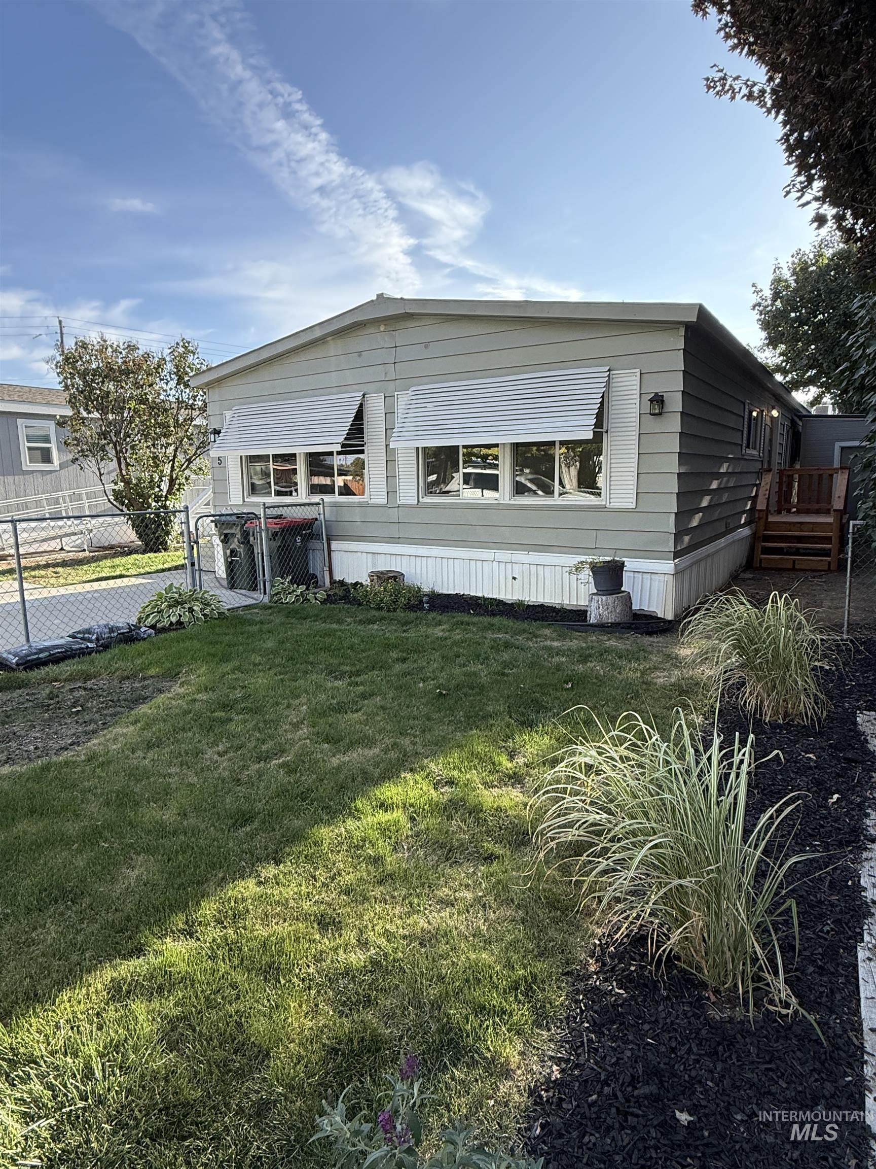 424 West Cherry Lane, Unit 5 Meridian, ID 83642 - Photo 25 of 27 Manufactured / mobile home with a gate