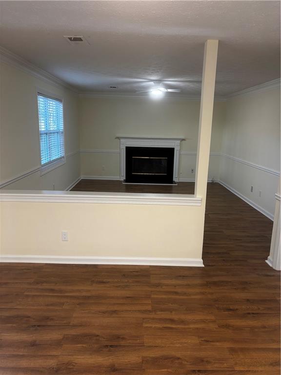 4538 Britt Road Tucker, GA 30084 - Photo 12 of 33 a view of an empty room with wooden floor and a window