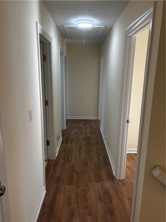 4538 Britt Road Tucker, GA 30084 - Photo 15 of 33 a view of a hallway with wooden floor