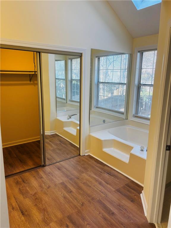 4538 Britt Road Tucker, GA 30084 - Photo 18 of 33 a view of an empty room with wooden floor and a window