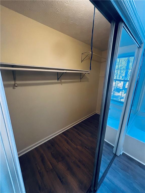 4538 Britt Road Tucker, GA 30084 - Photo 19 of 33 a view of closet with wooden floor