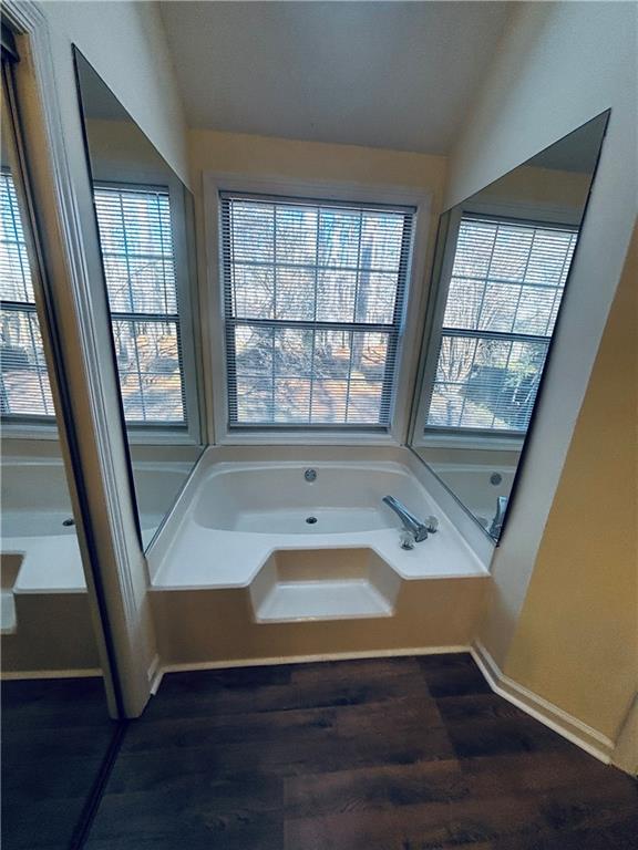 4538 Britt Road Tucker, GA 30084 - Photo 20 of 33 a view of a livingroom with wooden floor and staircase