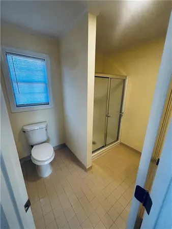 a bathroom with a toilet