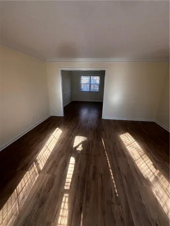 a view of an empty room and window