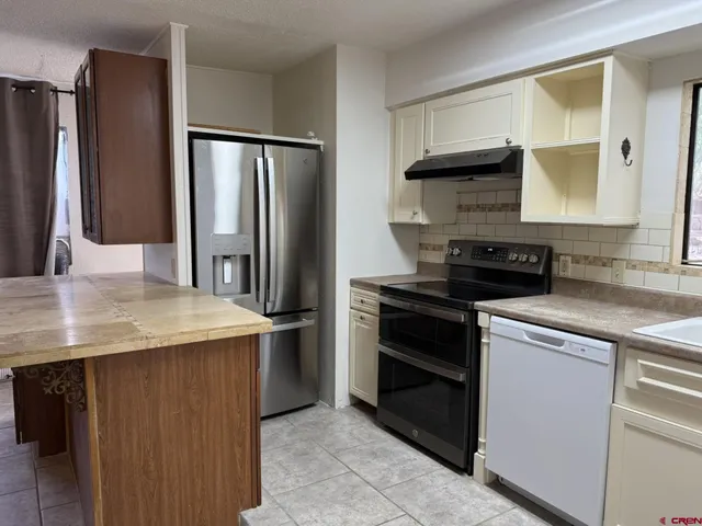 $450,000 | 464 1/2 Grand Avenue, Delta, CO 81416