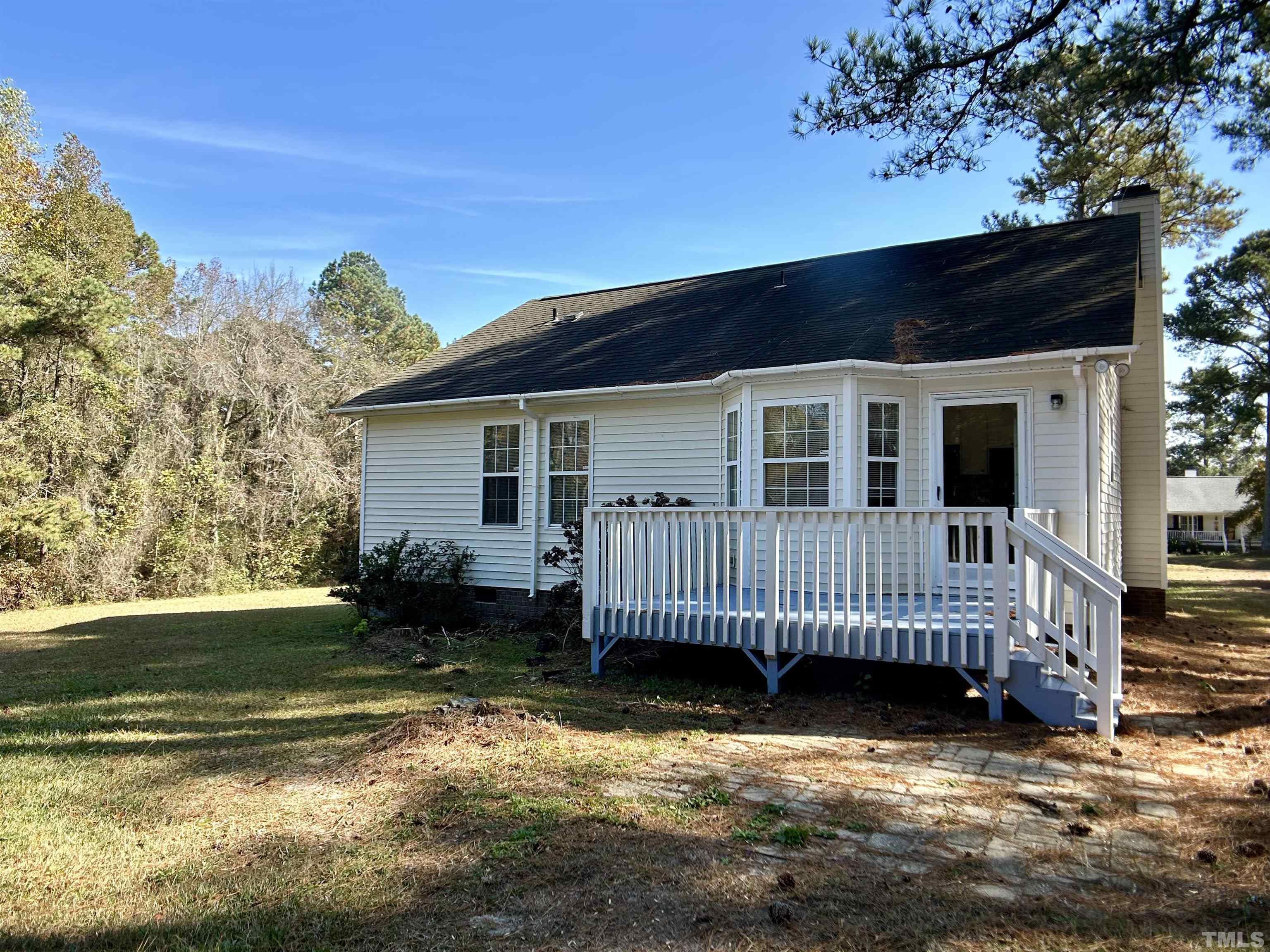 316 Amber Lane Willow Spring, NC 27592 - Photo 17 of 18 a view of a house with a yard