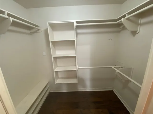 a view of a bathroom from a hallway