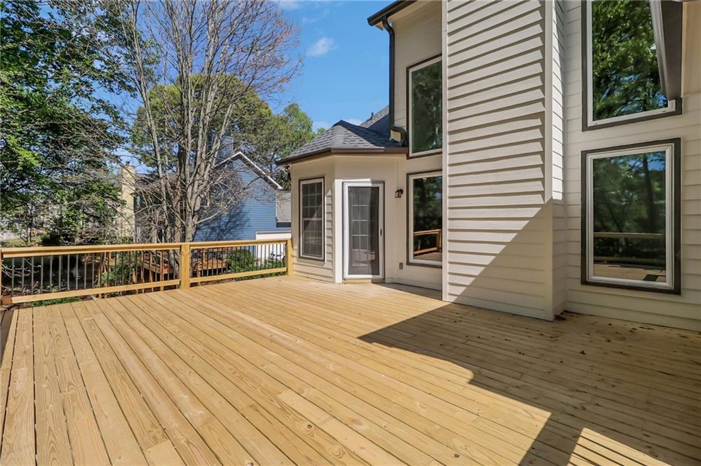 6259 Spring Lake Drive Flowery Branch, GA 30542 - Photo 24 of 35 a view of a house with wooden floor