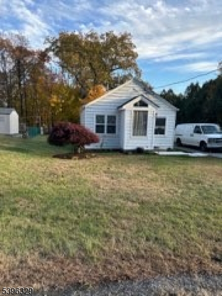16 Mt Arlington Road Ledgewood, NJ 07852 - Photo 6 of 8 a big white house with a big yard and large trees