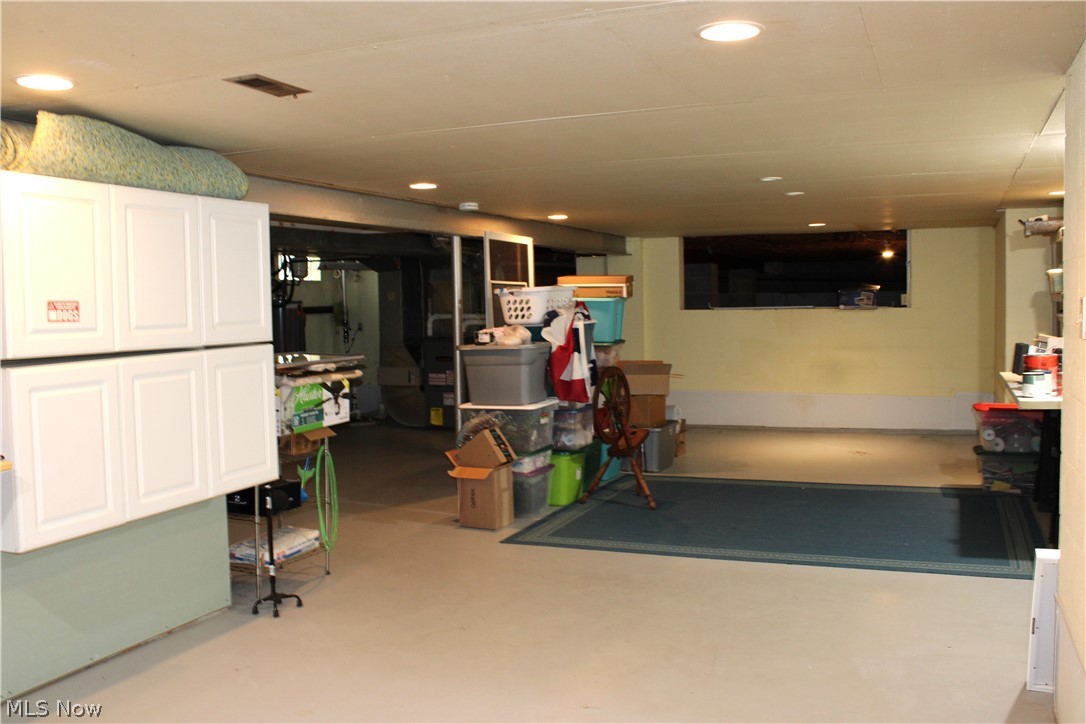 5547 River Styx Road Medina, OH 44256 - Photo 37 of 45 Basement space featuring recessed lighting, a drop ceiling