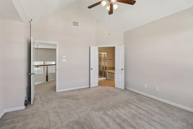 a bathroom with a double vanity sink mirror and shower