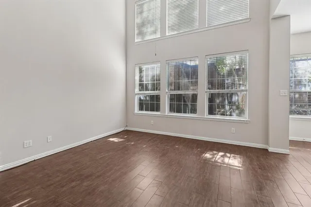 a view of empty room with stairs
