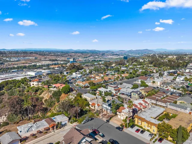 an aerial view of residential building with parking space