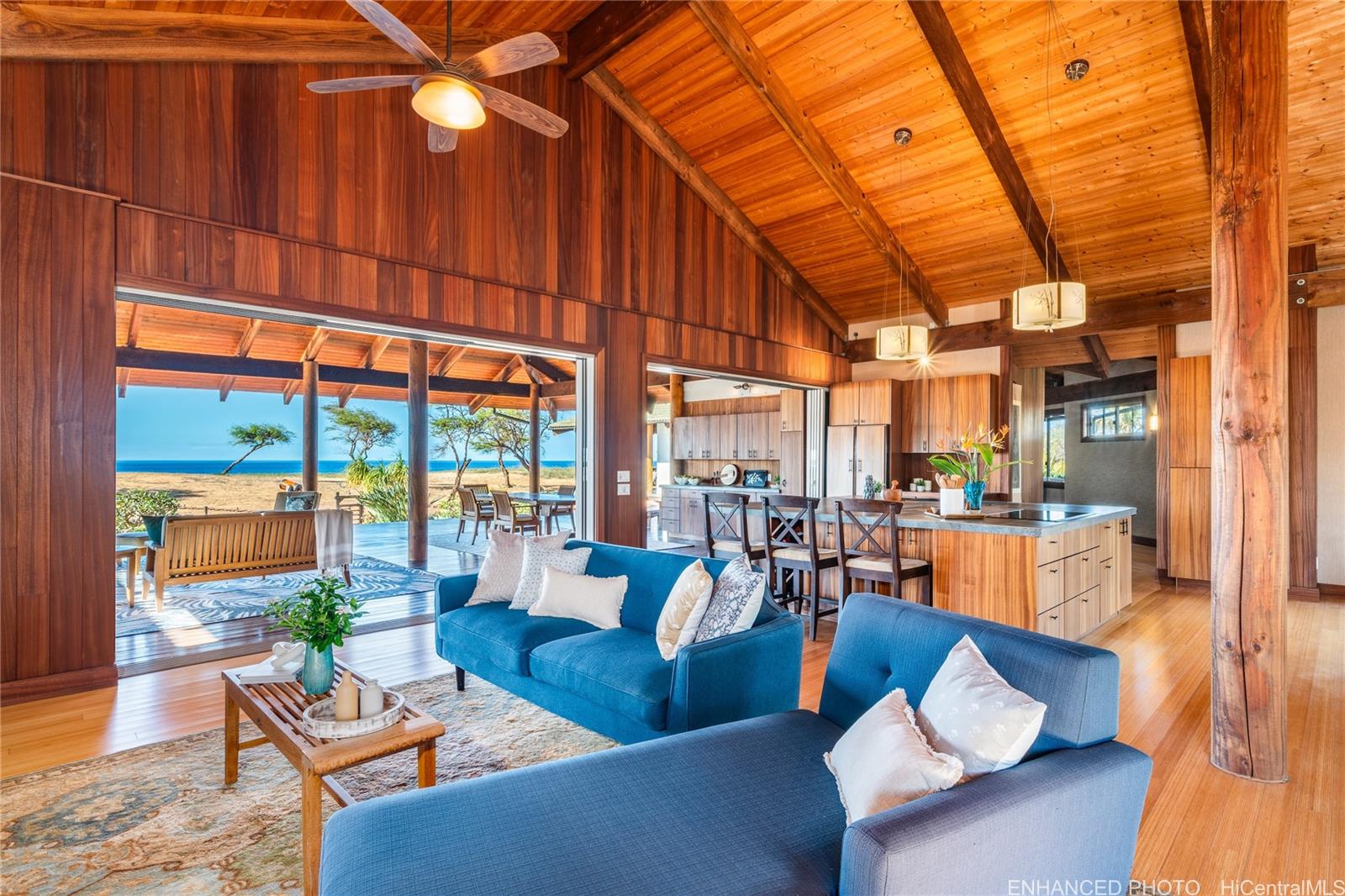 3036 Kalua Koi Road Maunaloa, HI 96770 - Photo 8 of 25 a living room with furniture and a large window
