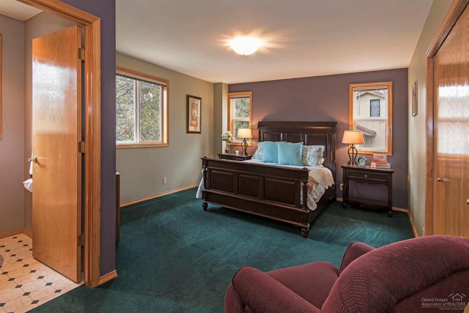 58043 Kinglet Road Sunriver, OR 97707 - Photo 11 of 18 This room is a warm and inviting place t
