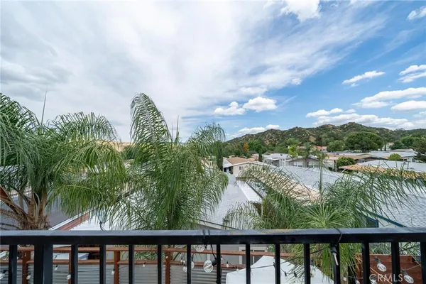 a view of a lake from a balcony