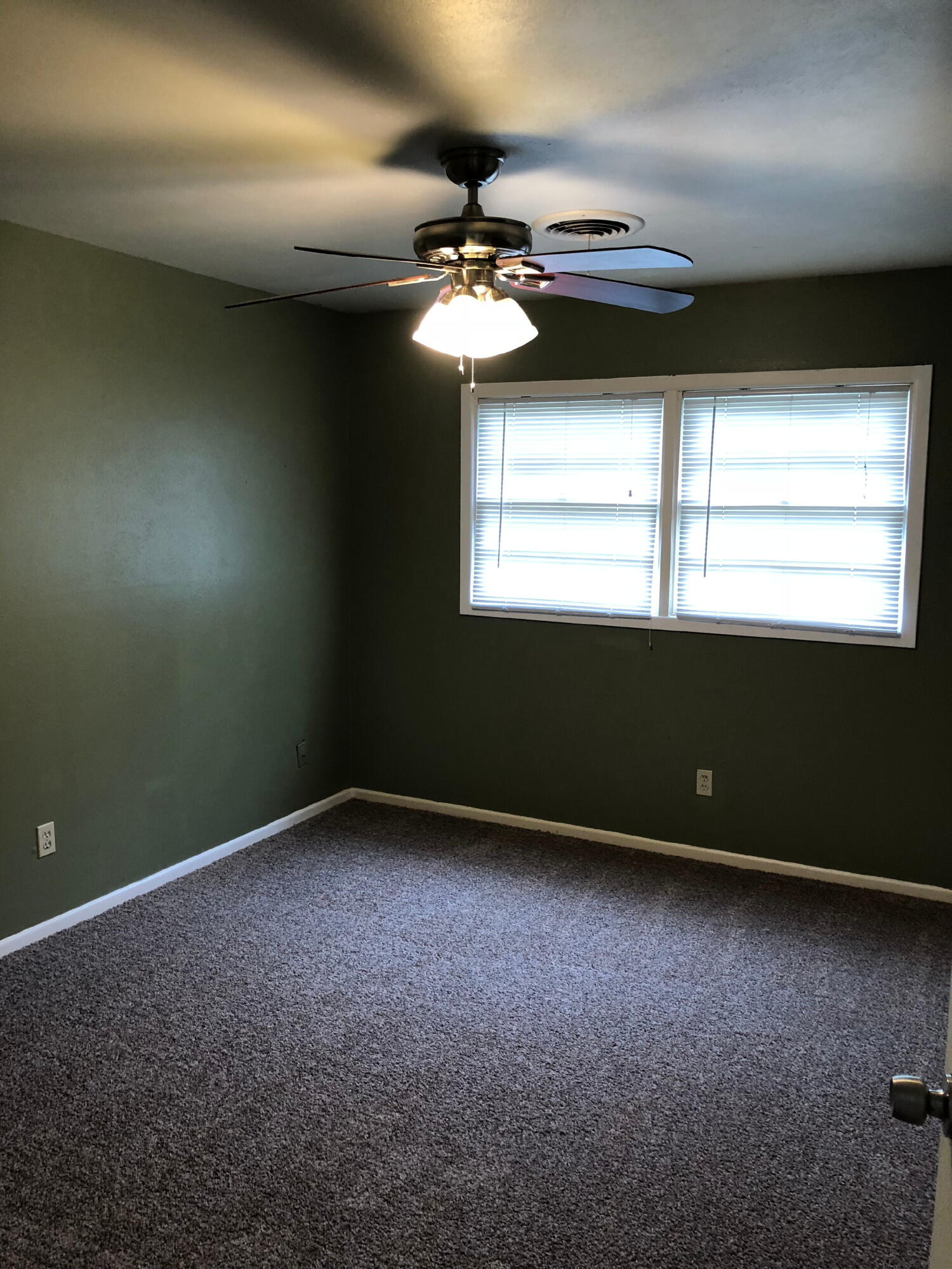 3020 45th Street Lubbock, TX 79413 - Photo 14 of 20 an empty room with a empty space and a window