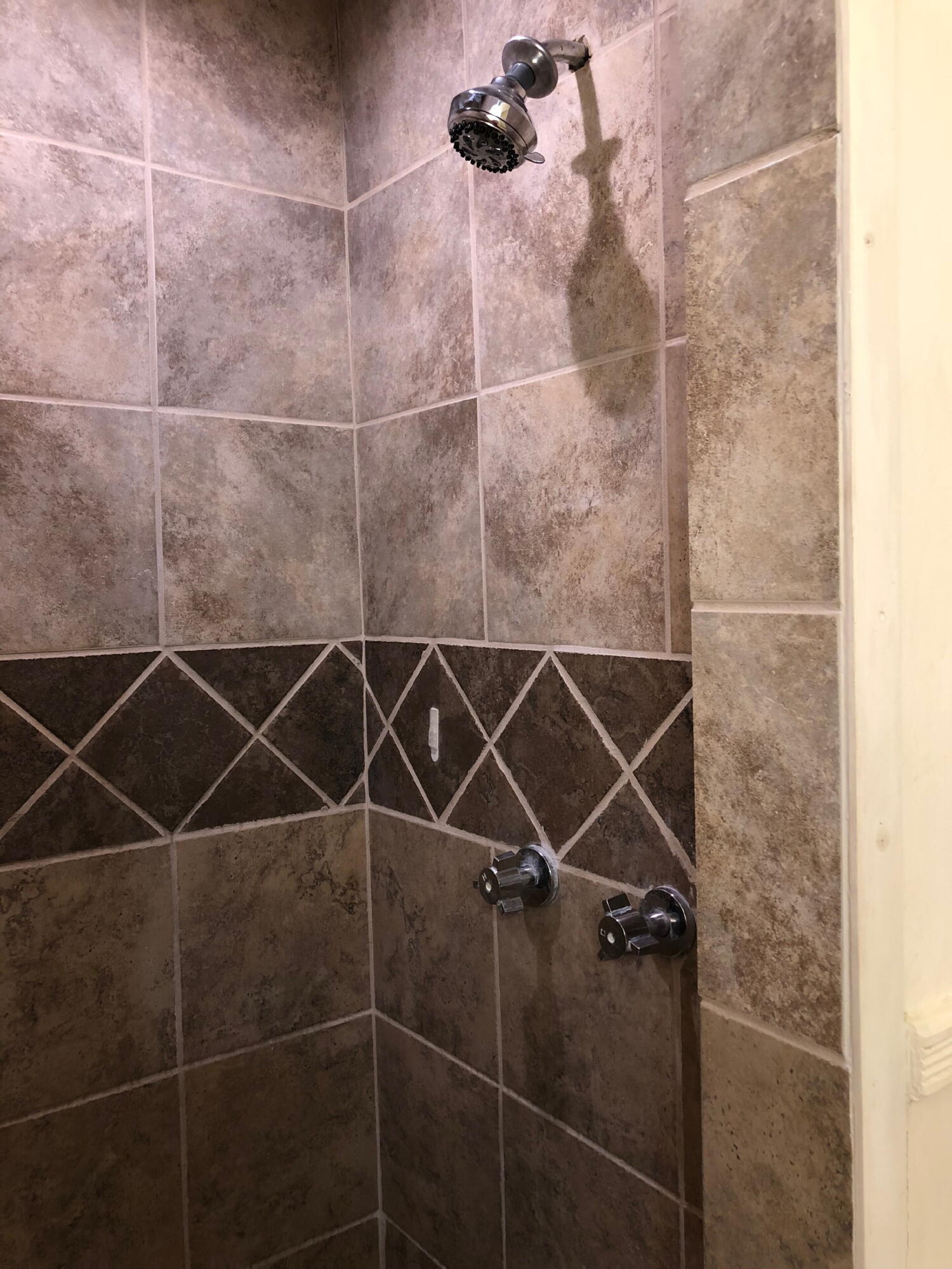 3020 45th Street Lubbock, TX 79413 - Photo 15 of 20 a bathroom with a shower