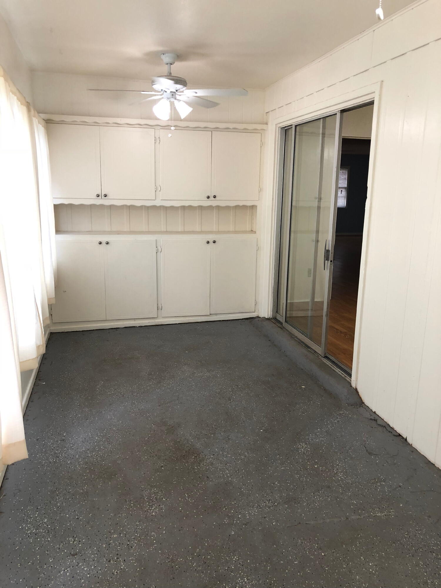 3020 45th Street Lubbock, TX 79413 - Photo 16 of 20 a view of a kitchen with refrigerator and window