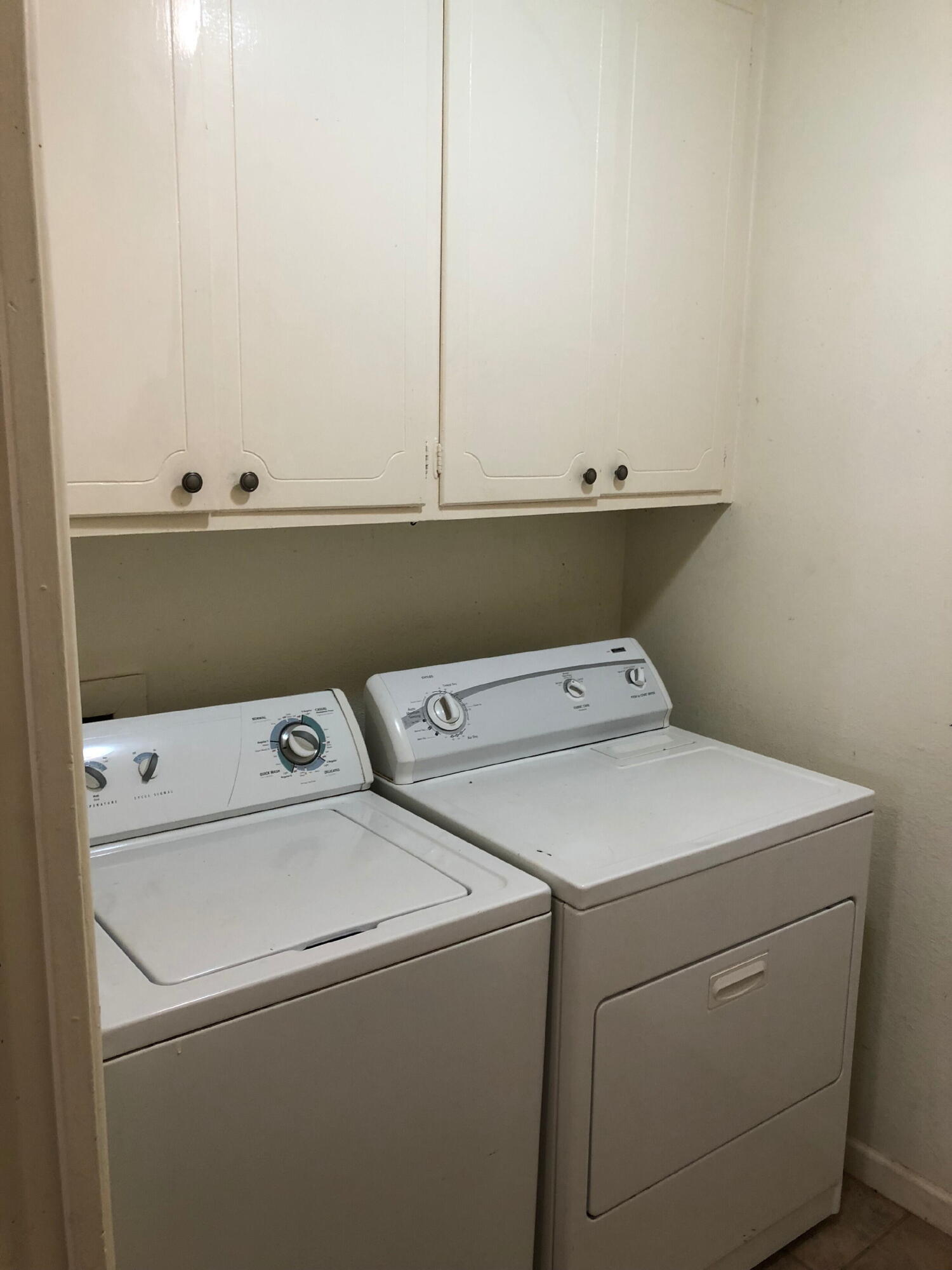 3020 45th Street Lubbock, TX 79413 - Photo 9 of 20 a utility room with dryer and washer