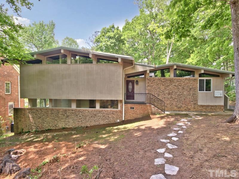 3005 Sandia Drive Raleigh, NC 27607 - Photo 1 of 25 a view of a house with a yard