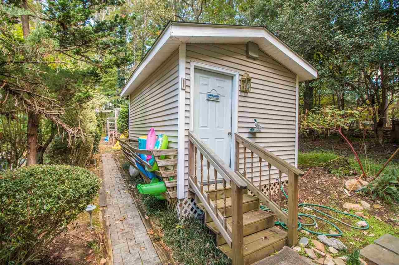 136 Bayleaf Drive Raleigh, NC 27615 - Photo 19 of 23 Bath house has a half bath! Great for getting ready to jump in the pool! Bath House