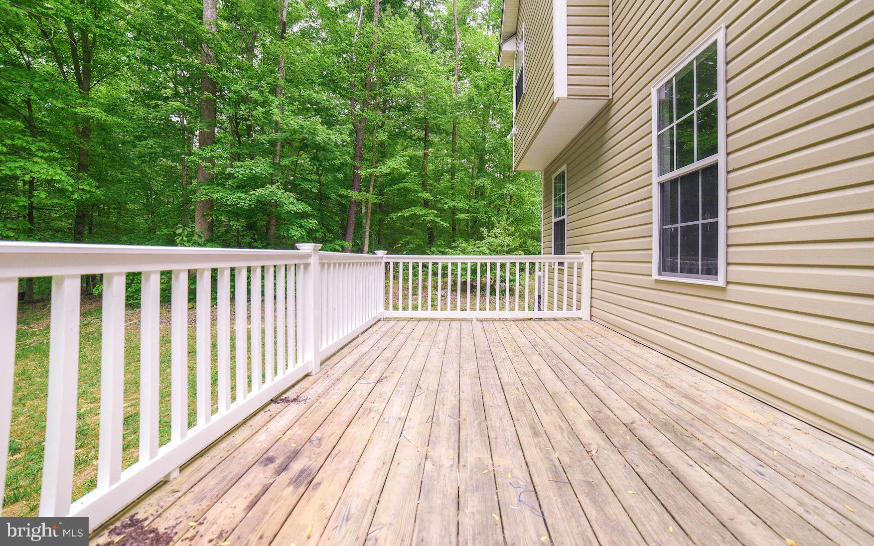 24110 McIntosh Road Hollywood, MD 20636 - Photo 12 of 40 Great deck backs to trees - break out the BBQ!