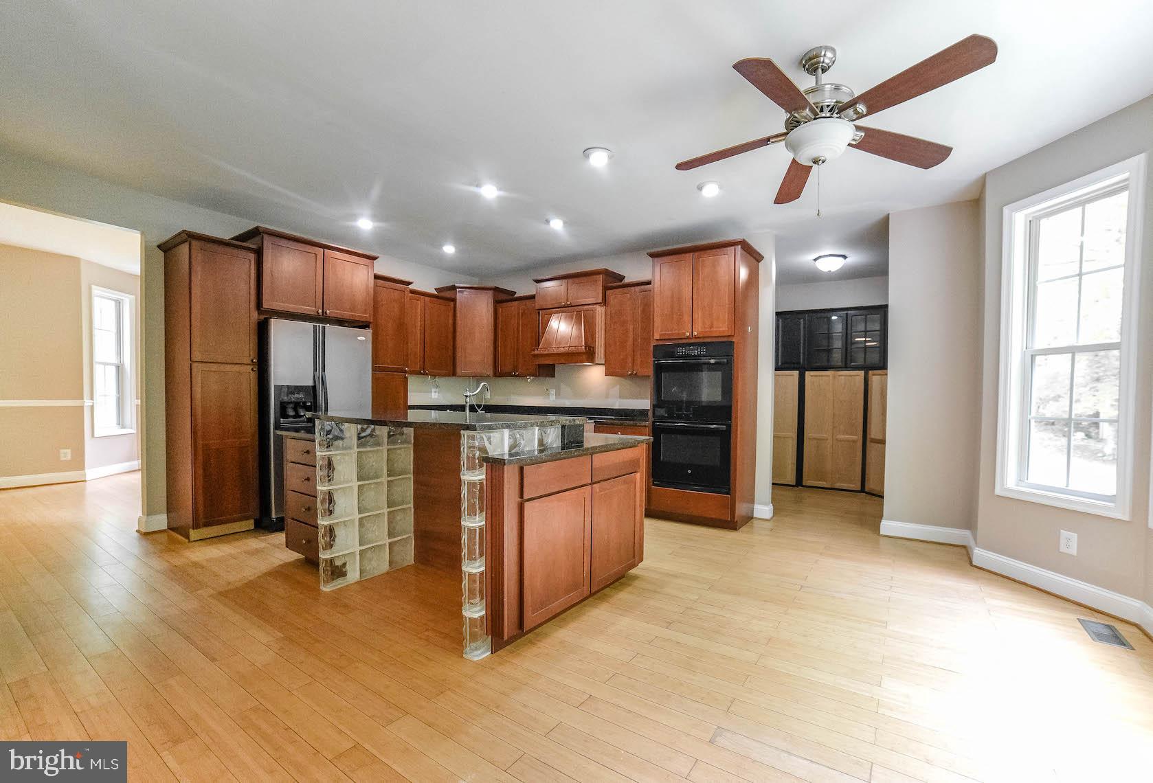 24110 McIntosh Road Hollywood, MD 20636 - Photo 3 of 40 Open kitchen with island and breakfast nook
