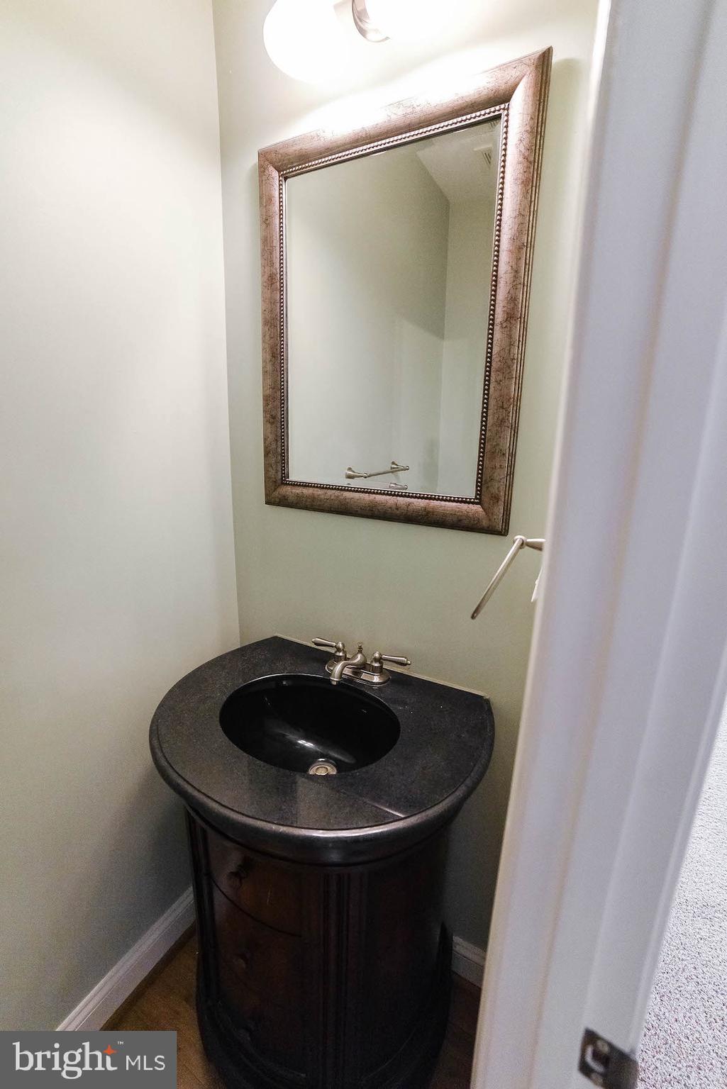 24110 McIntosh Road Hollywood, MD 20636 - Photo 22 of 40 Half bath for guests