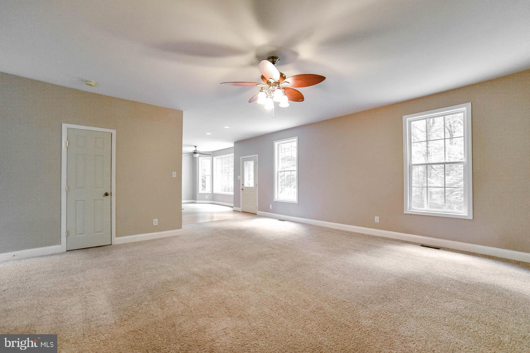 24110 McIntosh Road Hollywood, MD 20636 - Photo 23 of 40 Family room with door out to back deck