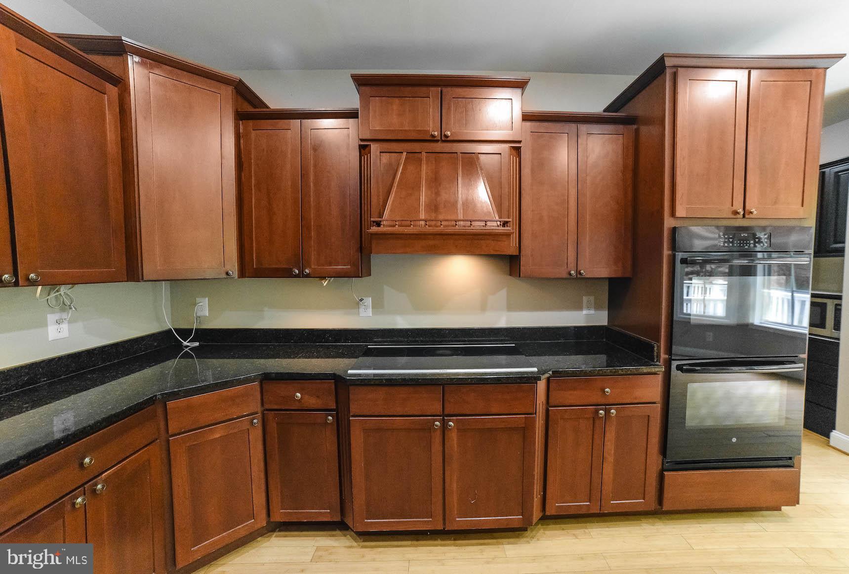 24110 McIntosh Road Hollywood, MD 20636 - Photo 4 of 40 Attractive cabinets and granite counters
