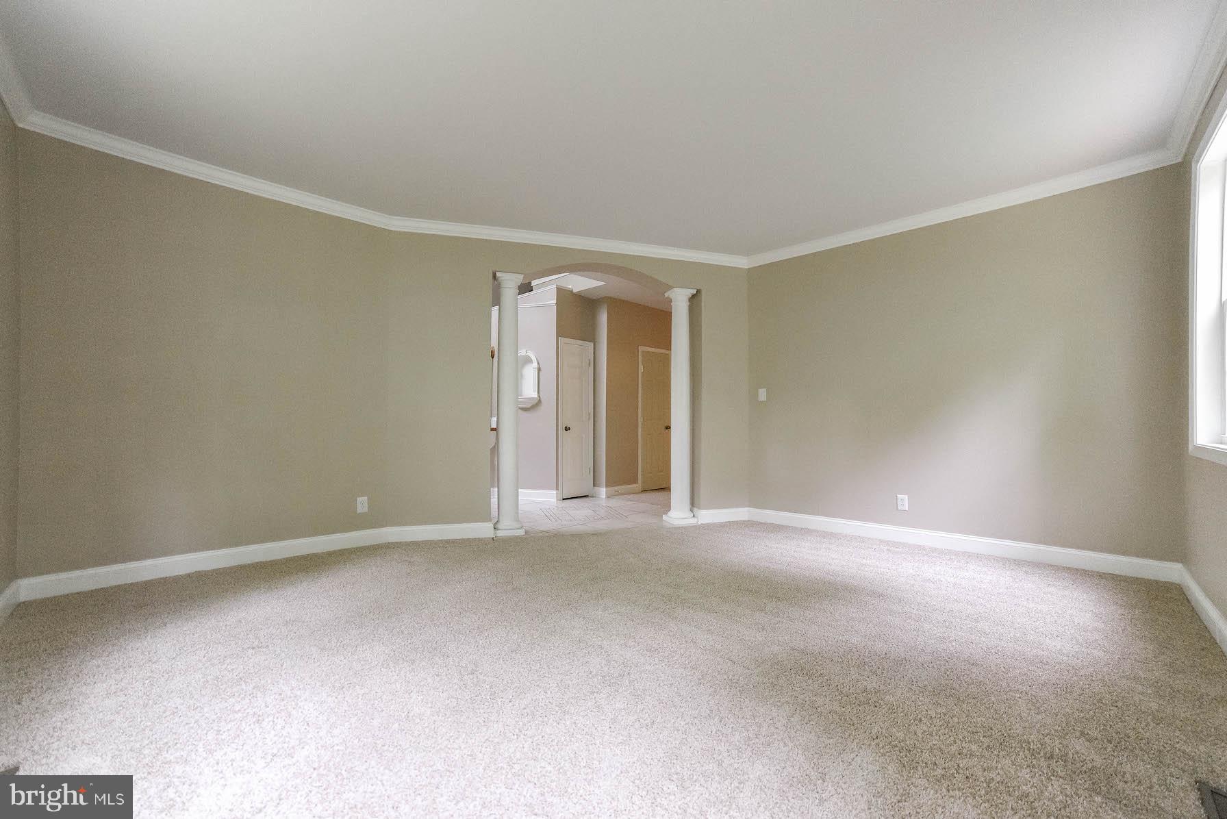 24110 McIntosh Road Hollywood, MD 20636 - Photo 6 of 40 Columned entry into formal living room