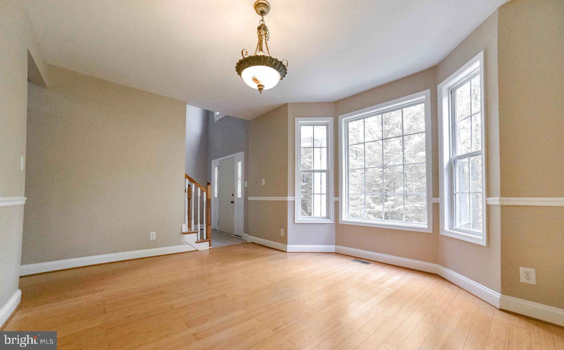 24110 McIntosh Road Hollywood, MD 20636 - Photo 7 of 40 Formal dining rm with good-looking bamboo flooring