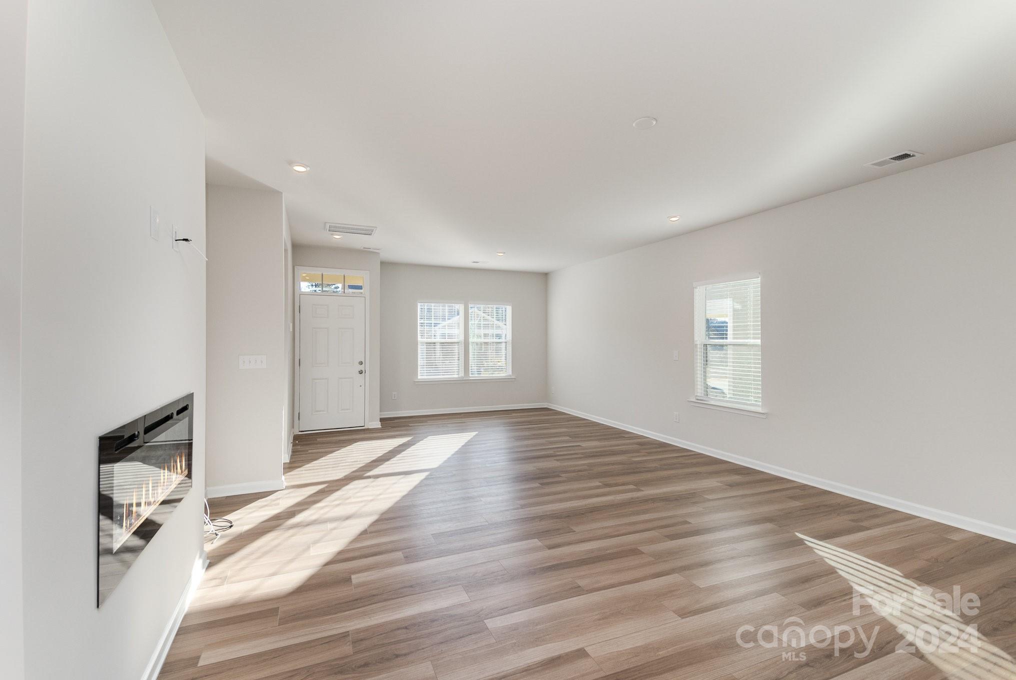 9130 Ramsford Road Charlotte, NC 28227 - Photo 3 of 18 a view of an empty room and window