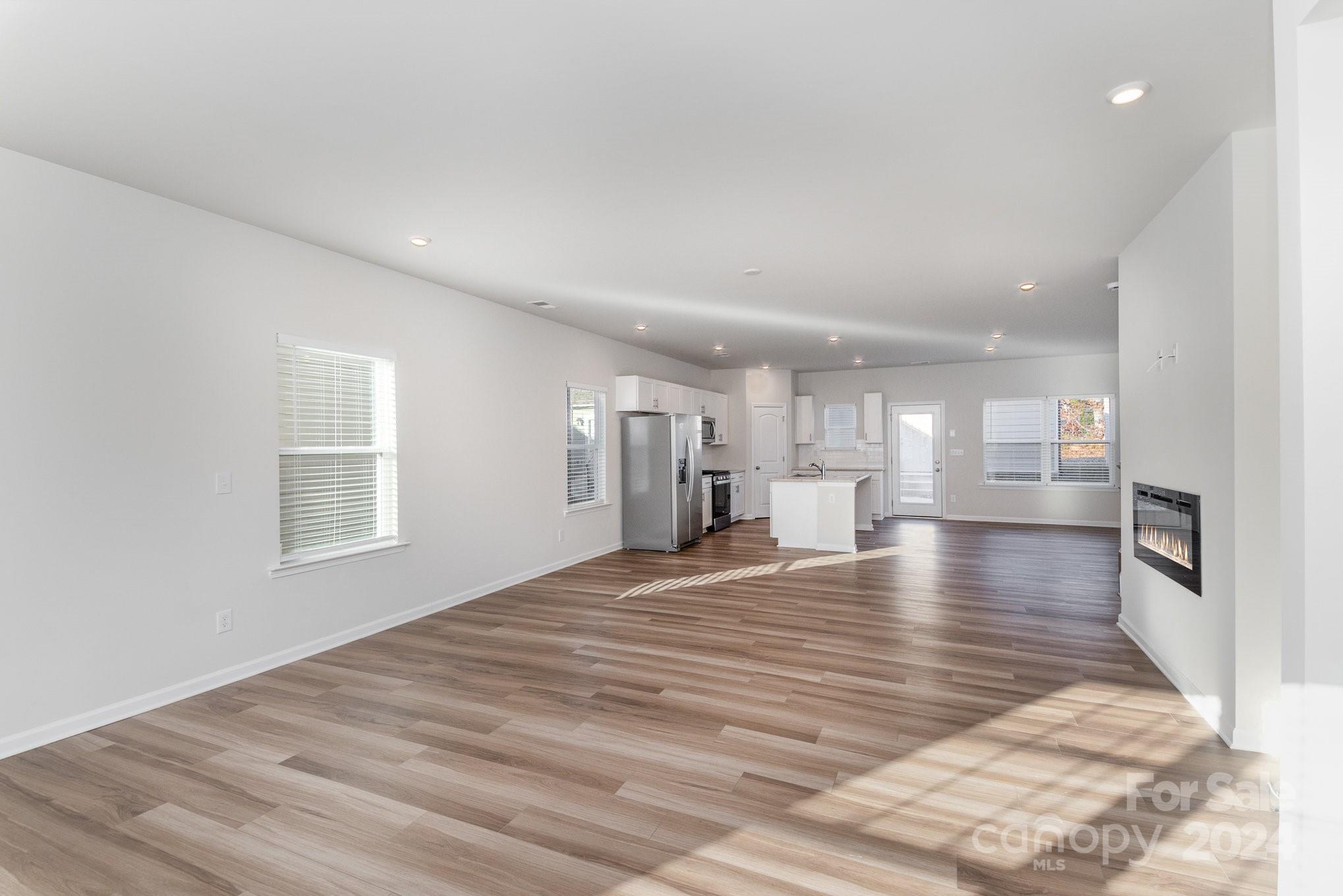 9130 Ramsford Road Charlotte, NC 28227 - Photo 4 of 18 a view of a kitchen with a sink and a window