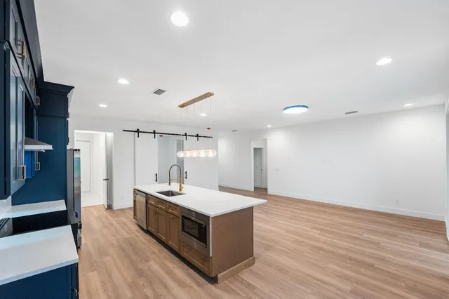 a large room with a lot of counter space