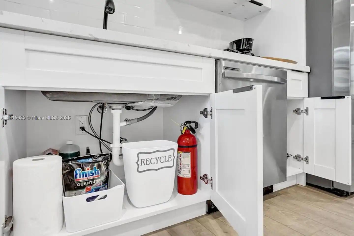 1573 Northeast 30th Court Pompano Beach, FL 33064 - Photo 17 of 27 a utility room with dryer and washer