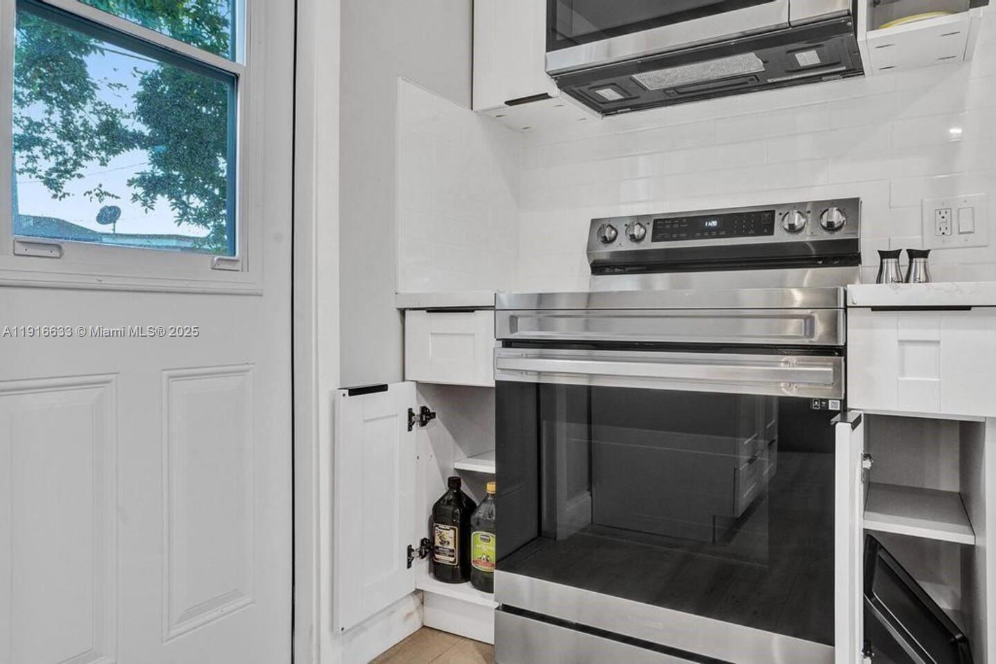 1573 Northeast 30th Court Pompano Beach, FL 33064 - Photo 9 of 27 a view of storage and utility room